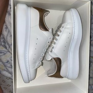 Women Alexander McQueens, white and rose gold. Size 8